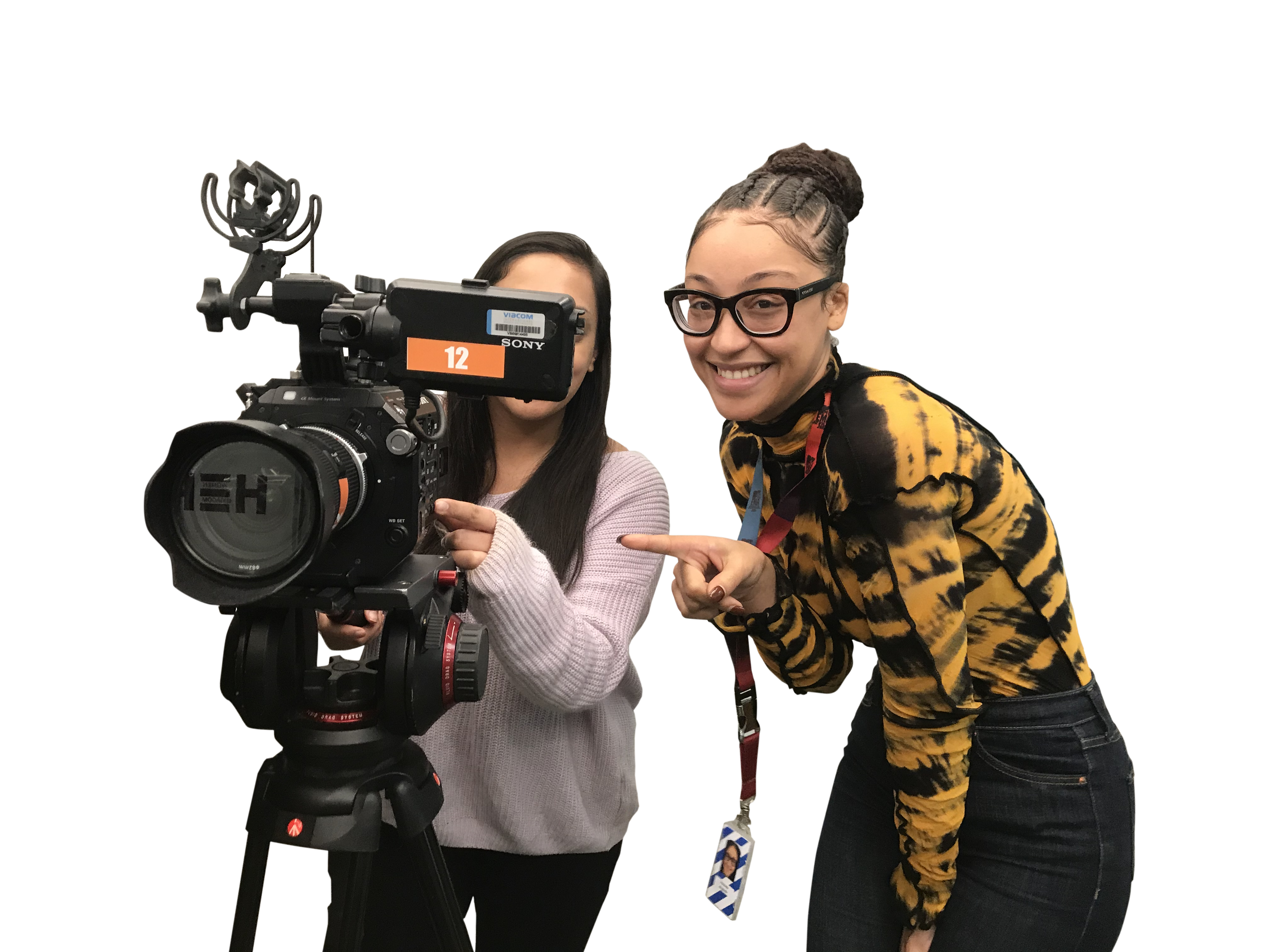 Two Paramount employees posing with a camera, filming.